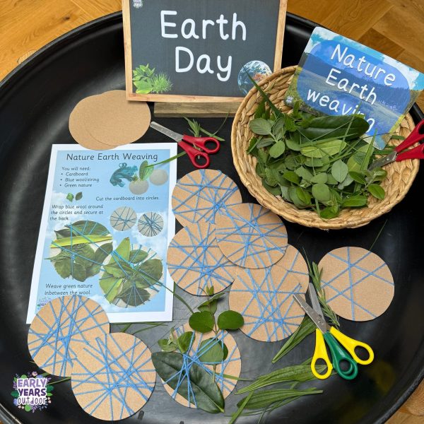 Nature earth weaving activity set up with instruction sheet, sign, bowl of green nature, scissors and the weaving circles