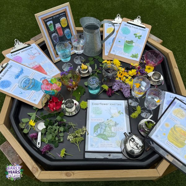 Summer drinks tuff tray with flowers and nature, a tea set and glasses