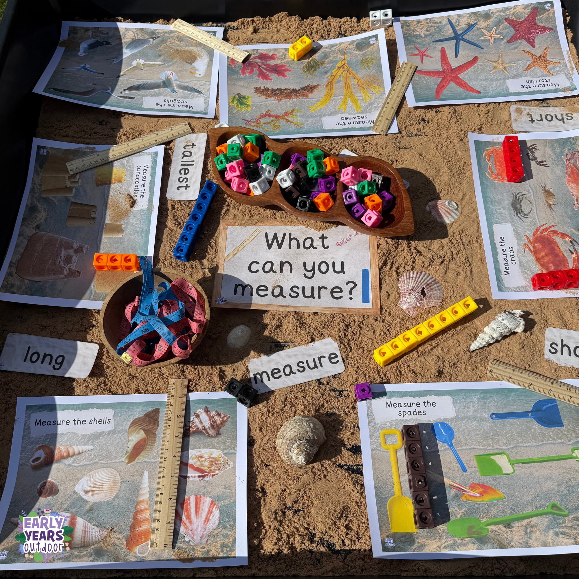 Measuring at the beach tuff tray Measuring at the beach tuff tray with tape measures, rulers, blocks and shells